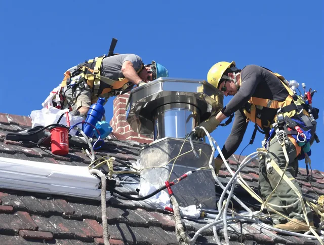 Protective chimney cap installed by Cleveland Chimney Sweep in Cleveland, OH
