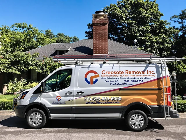 Cleveland Chimney Sweep technician removing creosote safely in Cleveland, OH