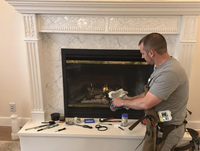 Cleveland Chimney Sweep performing fireplace maintenance in Cleveland, OH